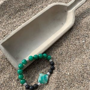 Green Lava Bead Bracelet with Statement Piece